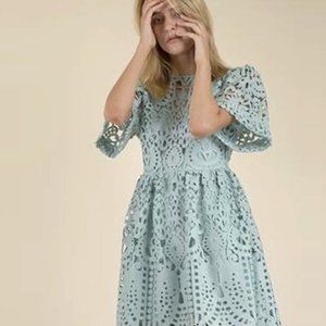 PERSEVERANCE London guipure lace bow back mini dress